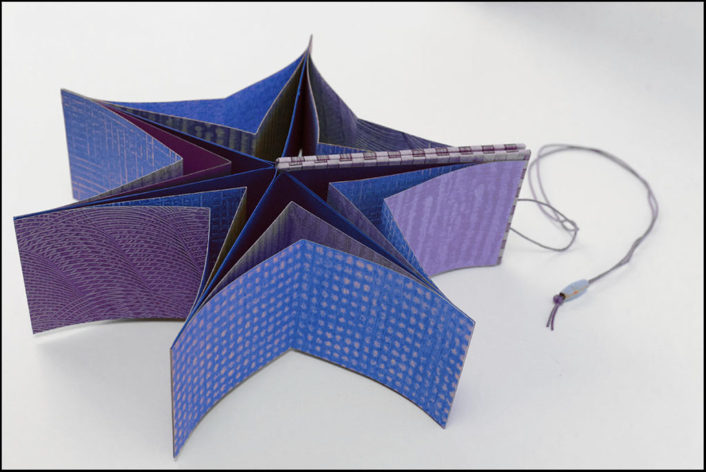 Star artist's book with paste papers by Cristina Hajosy